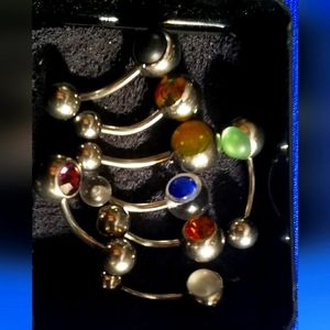 Seven different colors surgical (medical) still piercing earrings.